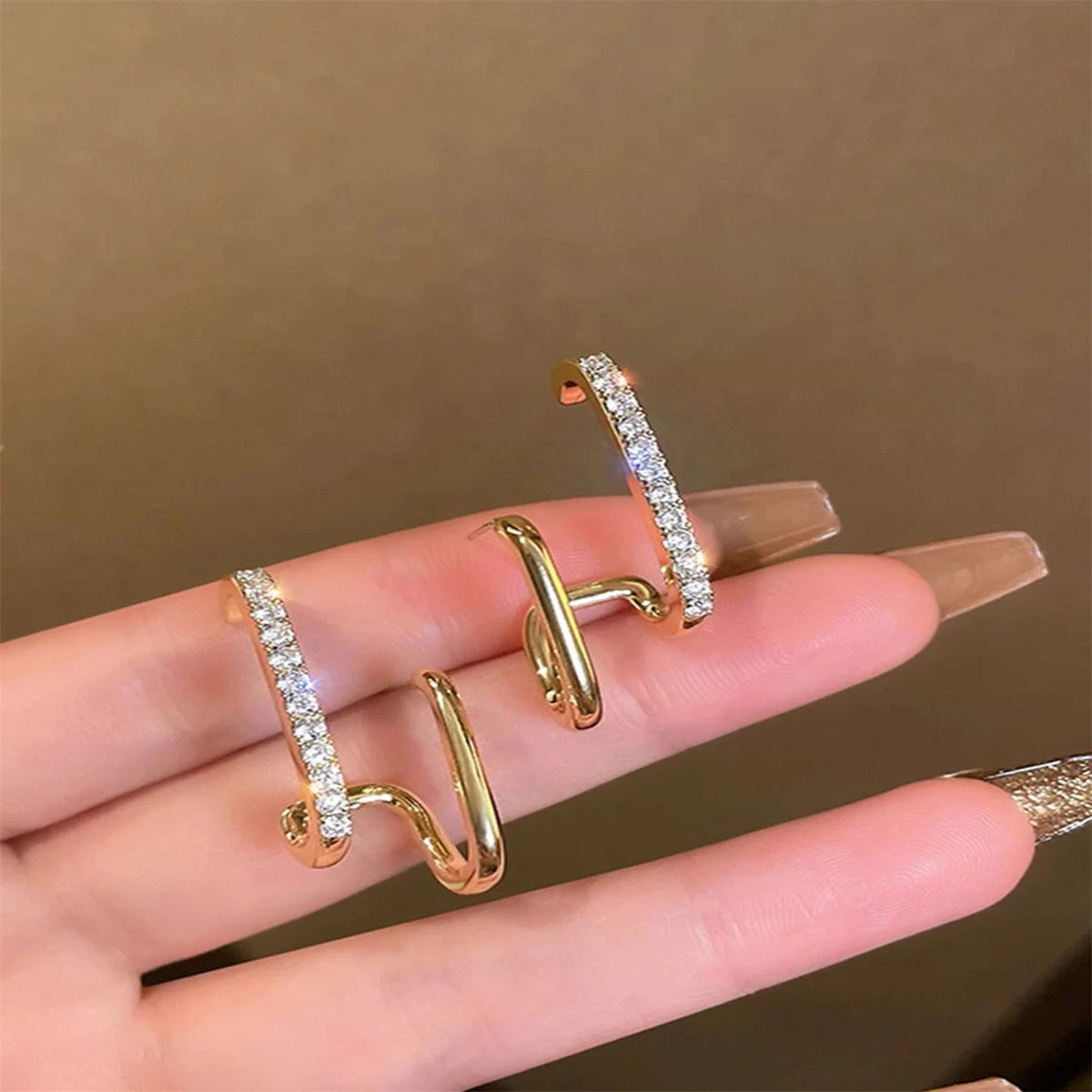 U-Luxe Crystal Earrings – Irregular Gold Statement  Modern shape. Crystal shine. Effortless luxury.