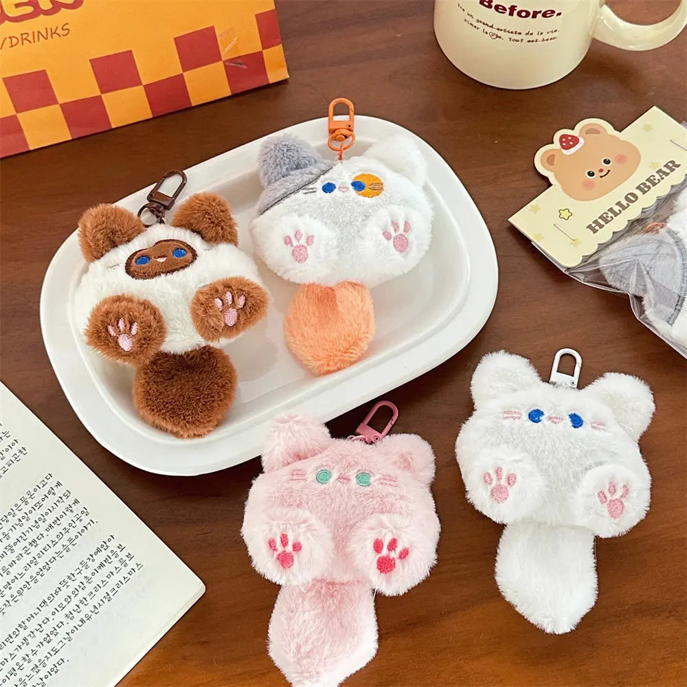 Purr Charm Plush – Cute Cat Doll Keychain  Soft, adorable, and full of personality.