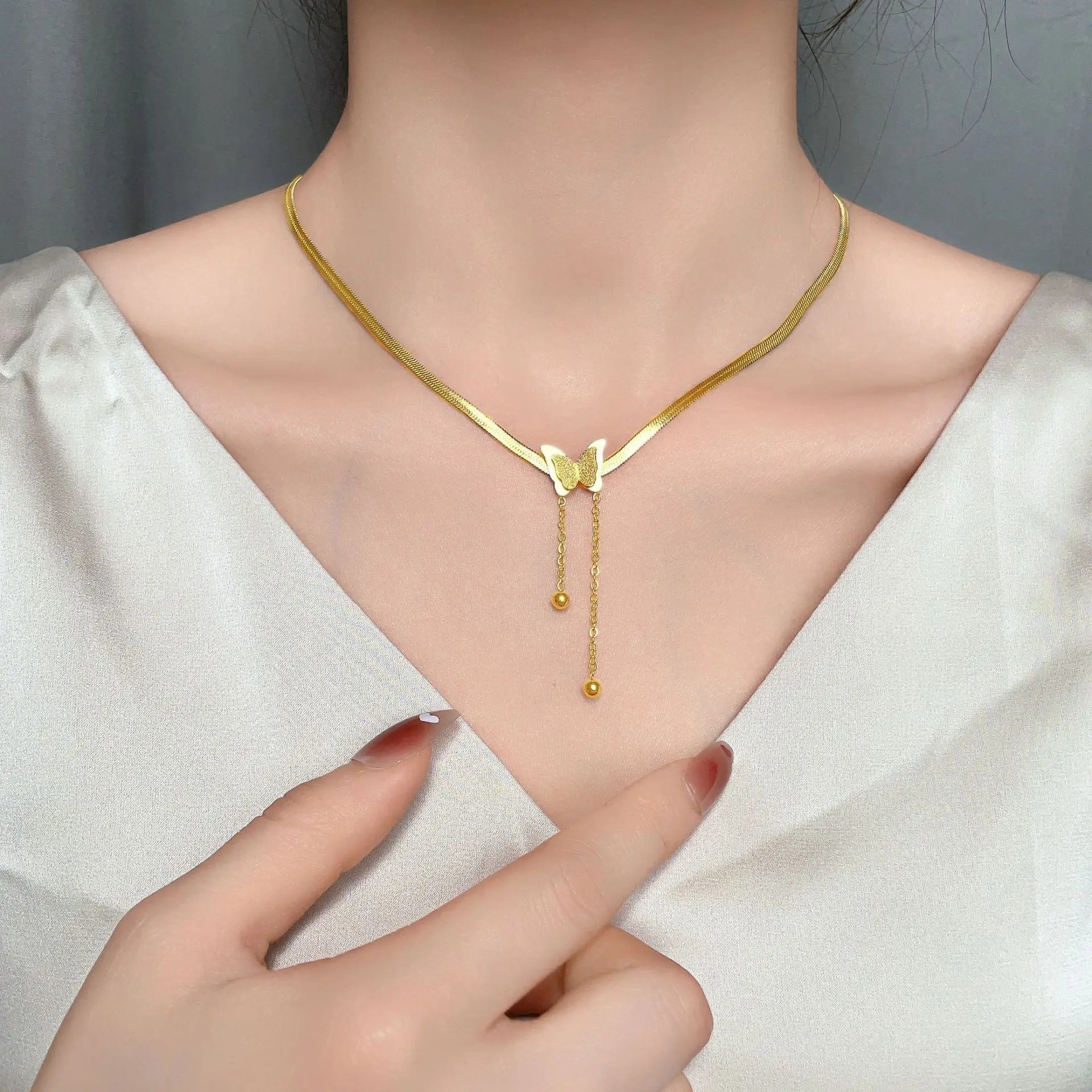 Frost Butterfly Necklace – Stainless Steel Snake Chain  Soft matte shine. Delicate charm. Effortless beauty.