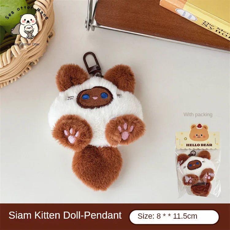 Purr Charm Plush – Cute Cat Doll Keychain  Soft, adorable, and full of personality.