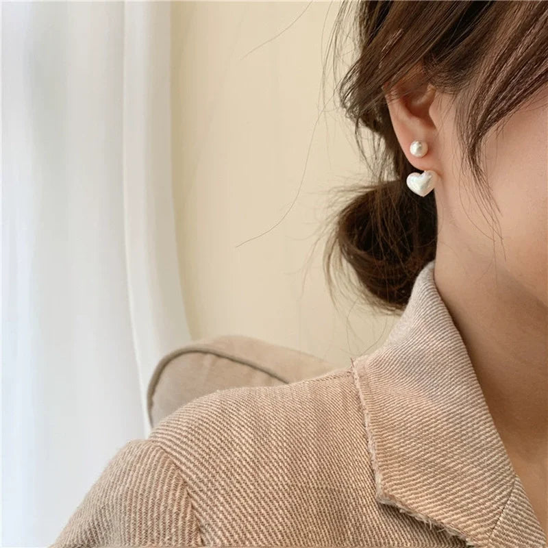 Heart Pearl Studs – Elegant Korean Love Earrings  Soft shine. Sweet charm. Timeless romance.