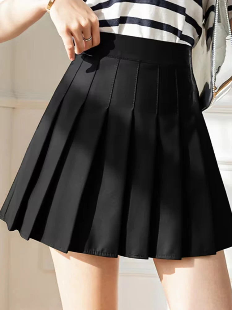 ClassyPleat Mini Skirt – High-Waist JK A-Line Style  Playful pleats. Flattering fit. Timeless vibe.