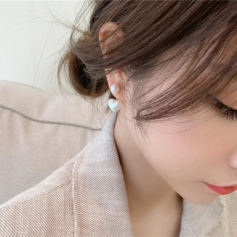 Heart Pearl Studs – Elegant Korean Love Earrings  Soft shine. Sweet charm. Timeless romance.
