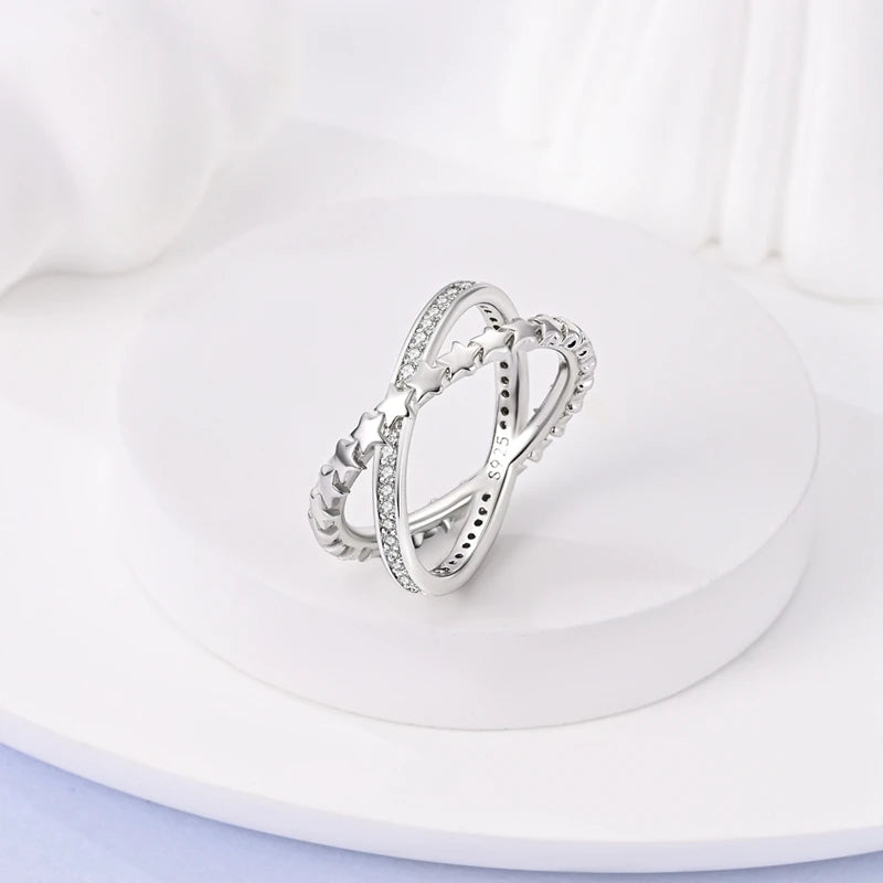InfinityTwist Ring – 925 Silver Zircon Band  Elegant lines. Timeless shine. A symbol of forever.