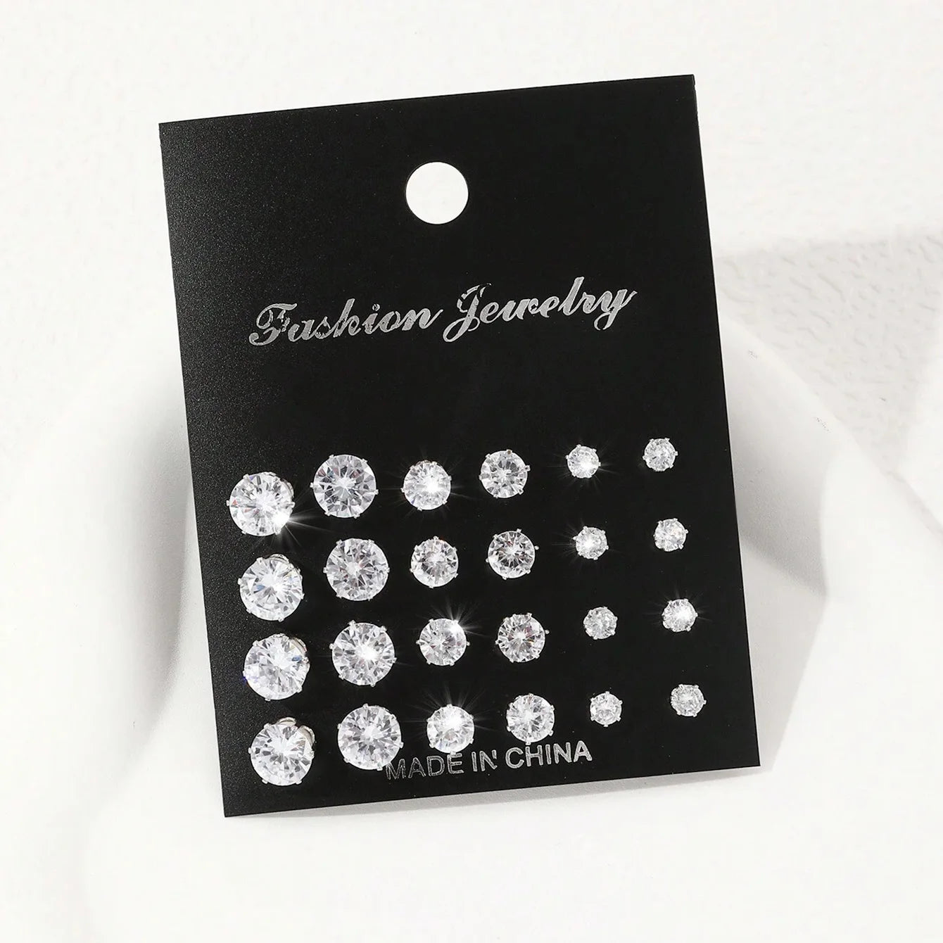 LuxeSpark Earring Set – 12 Pairs Zirconia Collection  Shine daily. Mix your style. Luxury made simple.