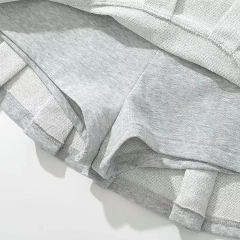PleatMuse Mini Skirt – Y2K Low-Waist A-Line Style  Playful, flirty, and effortlessly iconic.