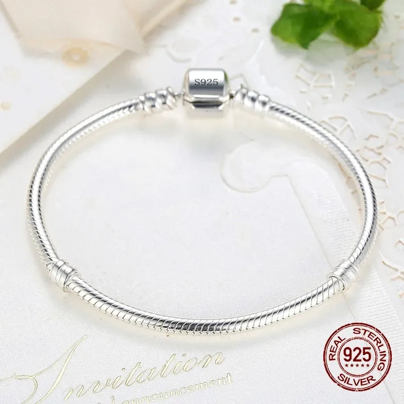 SilverSerpent Bracelet – 925 Sterling Snake Chain  Smooth shine. Timeless design. Pure elegance.
