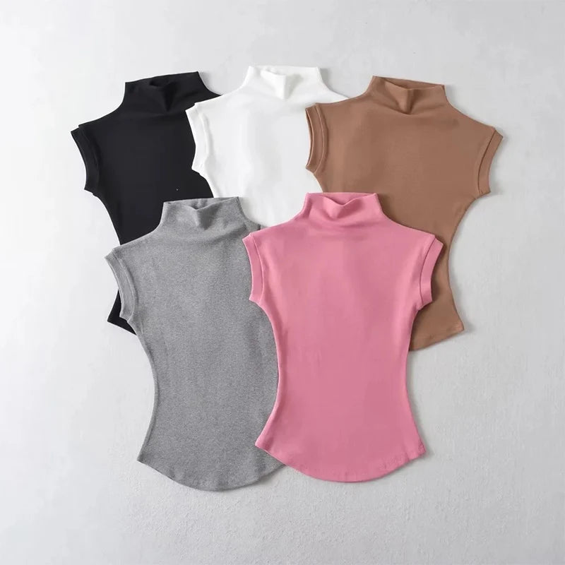 SleekMuse Sleeveless Tee – High Neck Slim Fit Top  Minimal design. Sculpted fit. Effortless style.