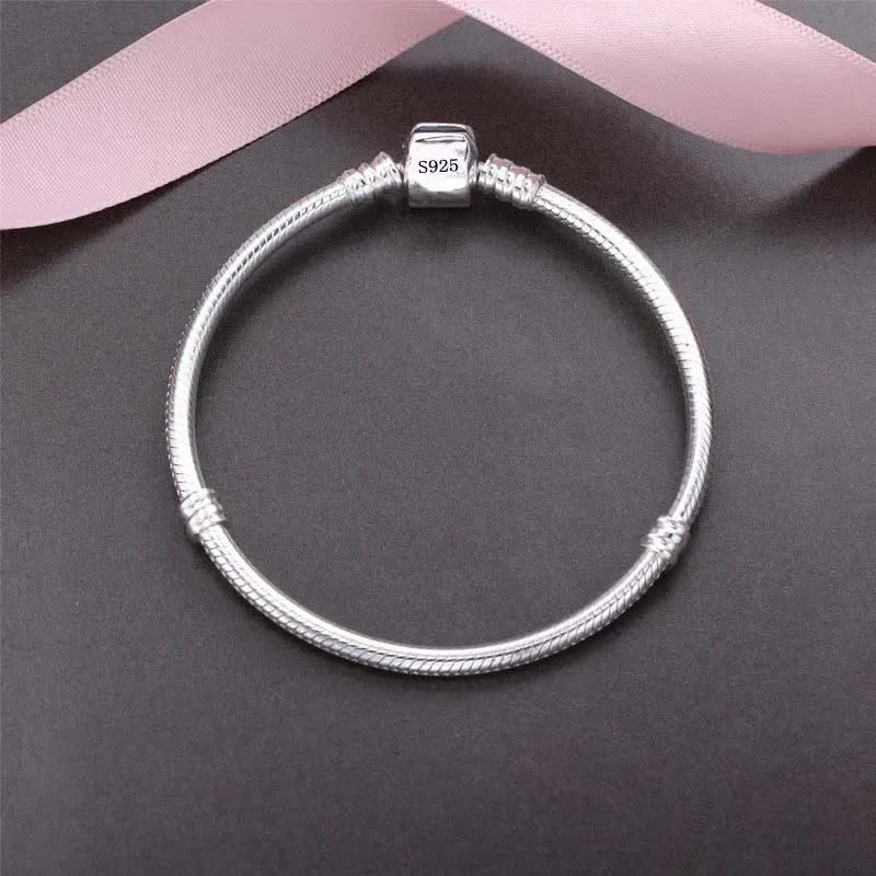 SilverSerpent Bracelet – 925 Sterling Snake Chain  Smooth shine. Timeless design. Pure elegance.
