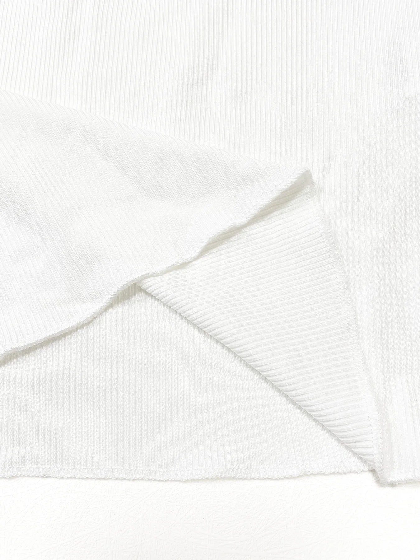 Rib Muse Button Tee – Long Sleeve Casual Top  Soft texture. Classic detail. Everyday style