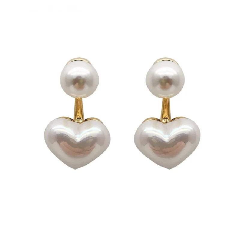 Love Pearl Earrings – Minimalist Heart Elegance  Simple love. Soft shine. Timeless beauty.