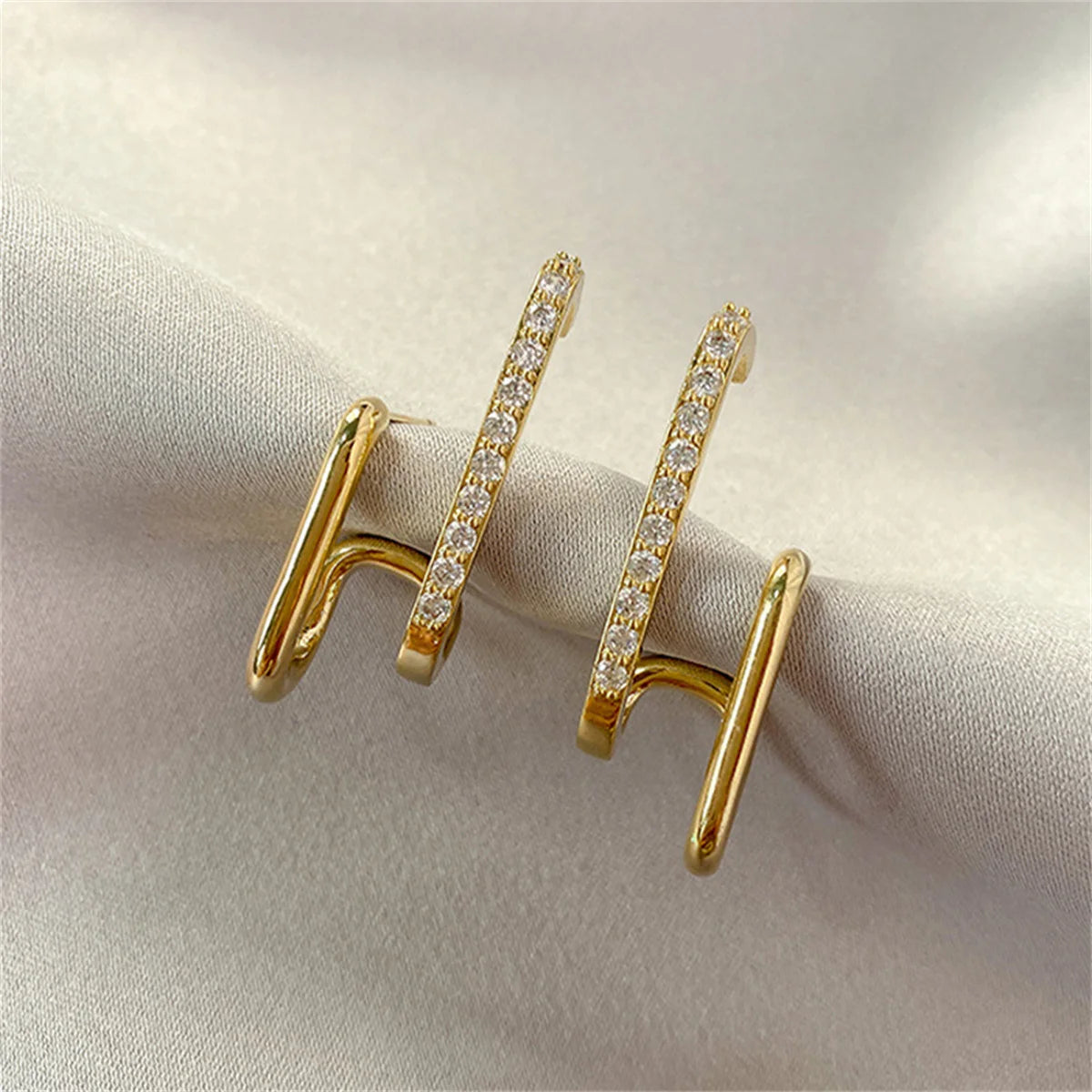 U-Luxe Crystal Earrings – Irregular Gold Statement  Modern shape. Crystal shine. Effortless luxury.