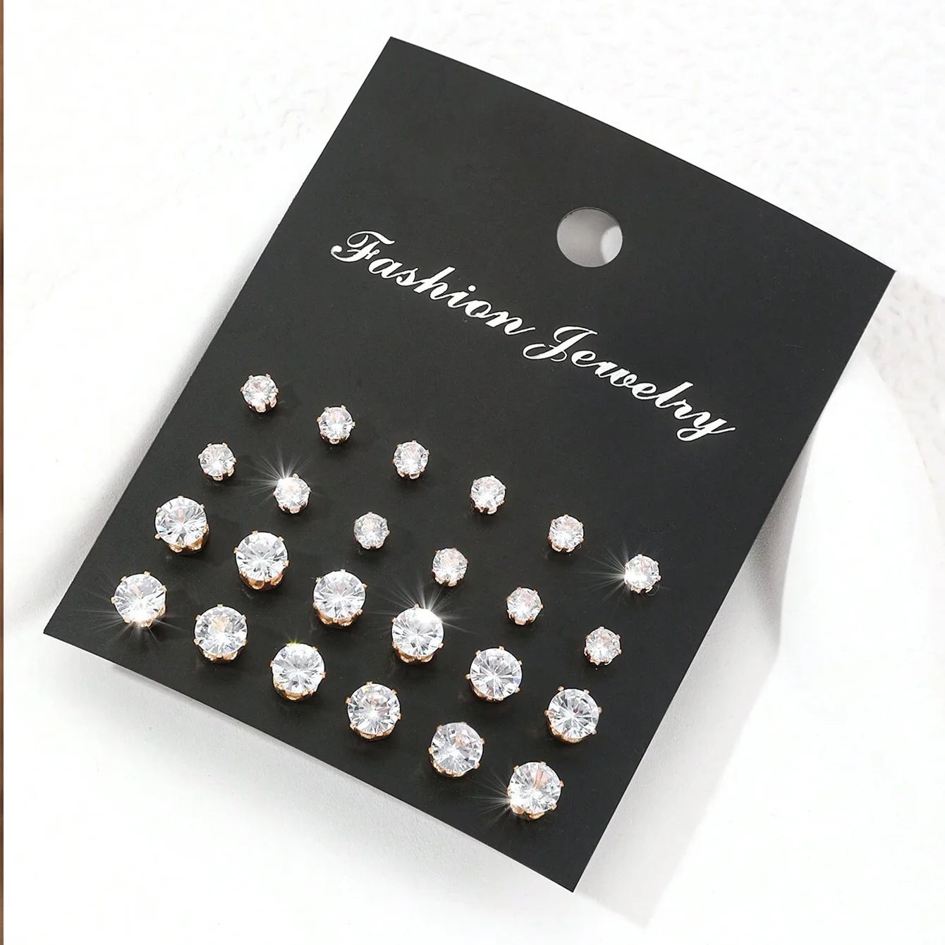 LuxeSpark Earring Set – 12 Pairs Zirconia Collection  Shine daily. Mix your style. Luxury made simple.