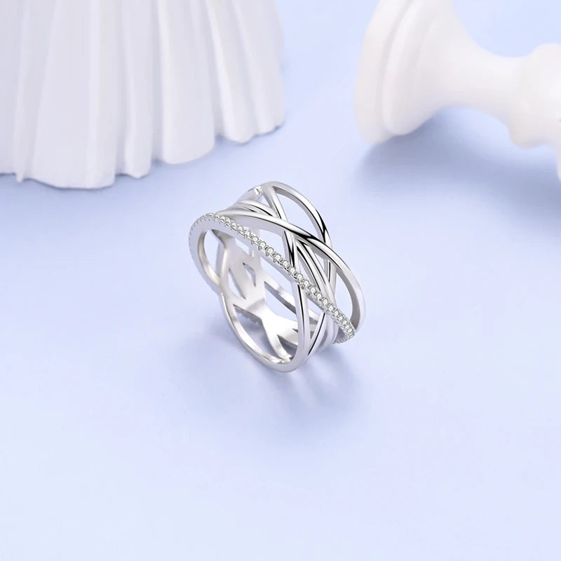 InfinityTwist Ring – 925 Silver Zircon Band  Elegant lines. Timeless shine. A symbol of forever.