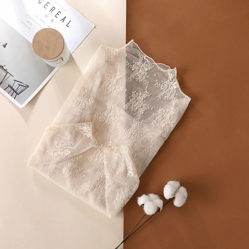 LaceMesh Crop Top – Sheer Long Sleeve Elegance  Delicate lace. Bold layers. Effortless style.