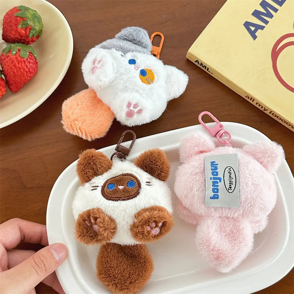 Purr Charm Plush – Cute Cat Doll Keychain  Soft, adorable, and full of personality.