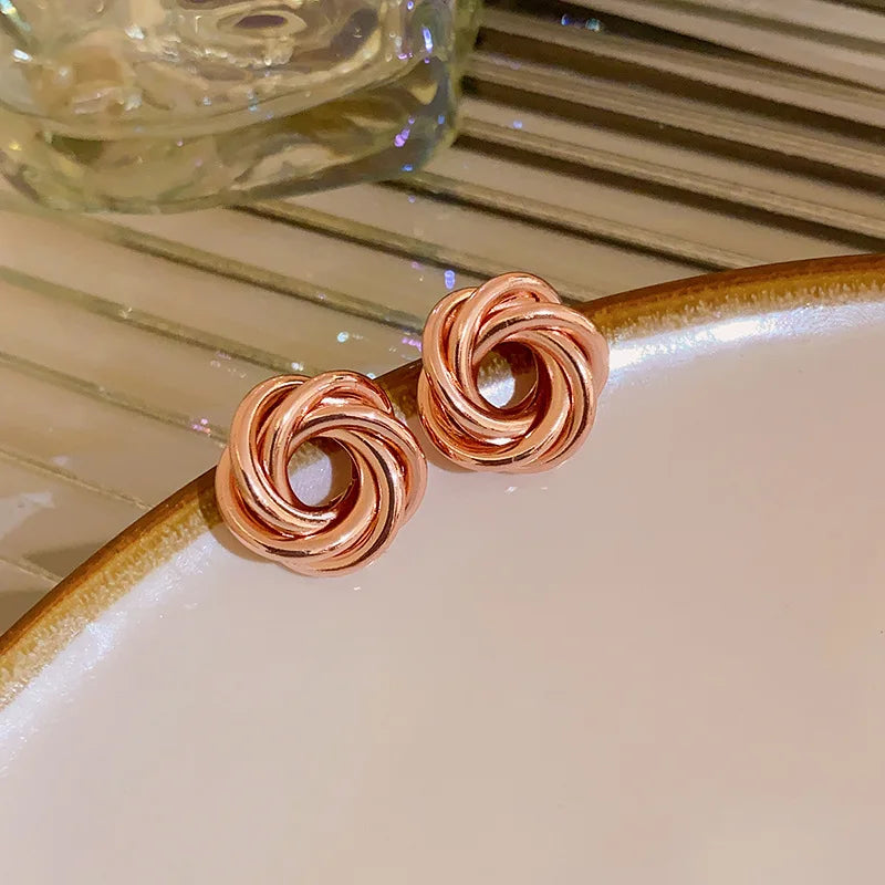 Twist Aura Hoops – Multi-Layer Geometric Earrings  Layered design. Bold shine. Modern elegance.