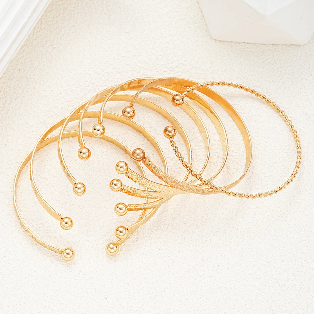 Gold Punk Heart Bracelet Set (7 Pieces) – Fashion Bangles for Women