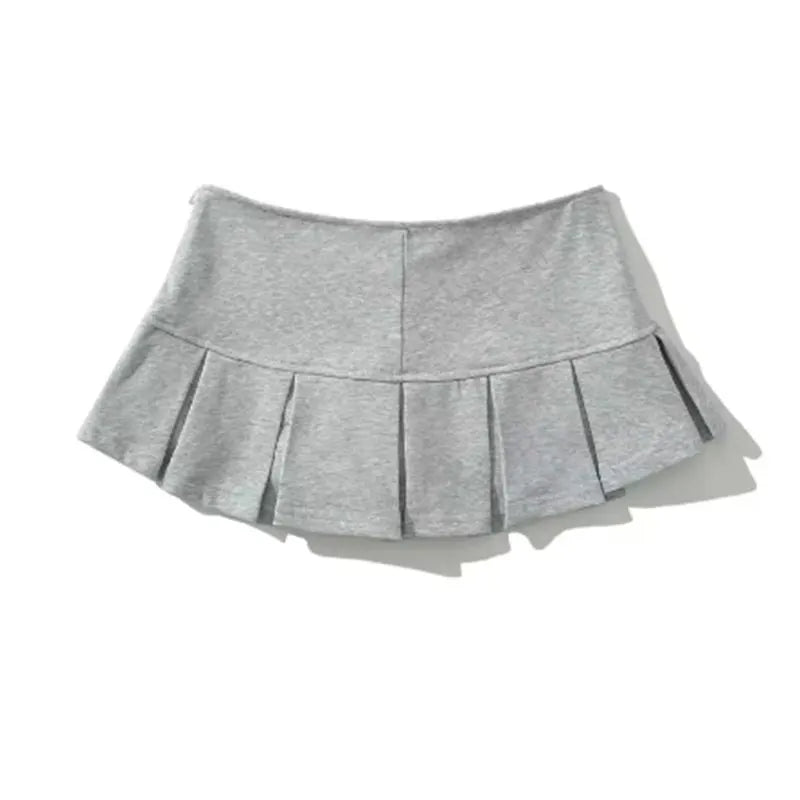 PleatMuse Mini Skirt – Y2K Low-Waist A-Line Style  Playful, flirty, and effortlessly iconic.