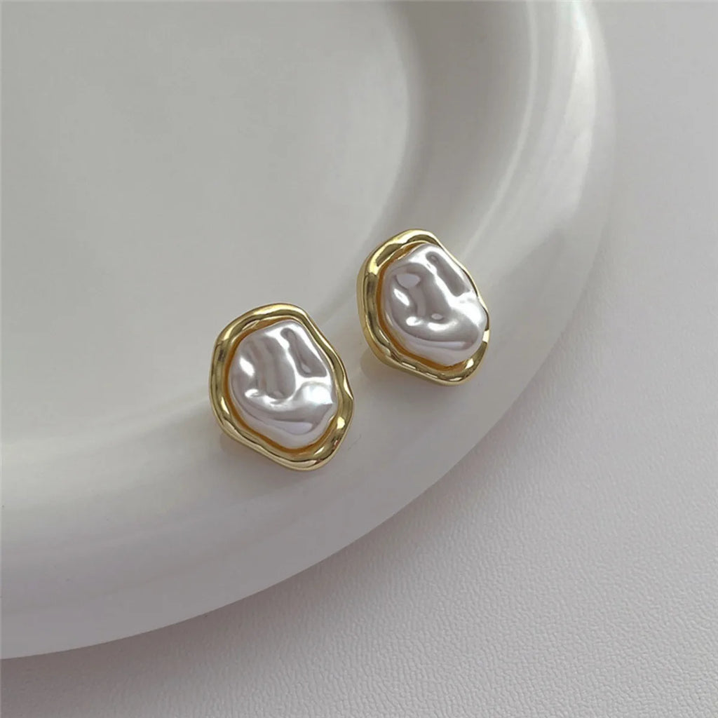 PearlEdge Studs – Irregular Metal Pearl Earrings  Classic pearls. Modern shape. Effortless elegance.