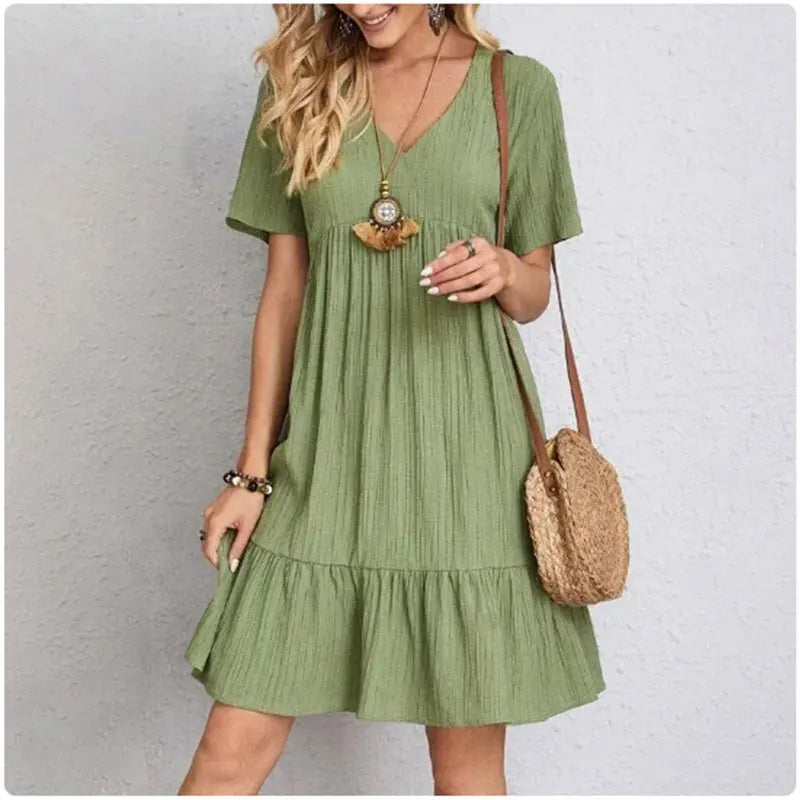 FlareMuse Peplum Dress – V-Neck Ruffle Summer Style  Soft flow. Flattering shape. Effortless charm.