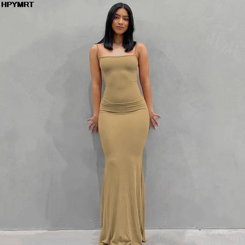 SilkAura Satin Maxi Dress – Backless Bodycon Elegance  Smooth shine. Timeless beauty. Effortless allure.