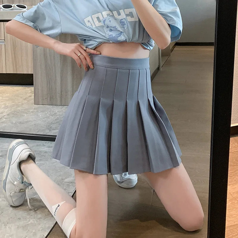 ClassyPleat Mini Skirt – High-Waist JK A-Line Style  Playful pleats. Flattering fit. Timeless vibe.