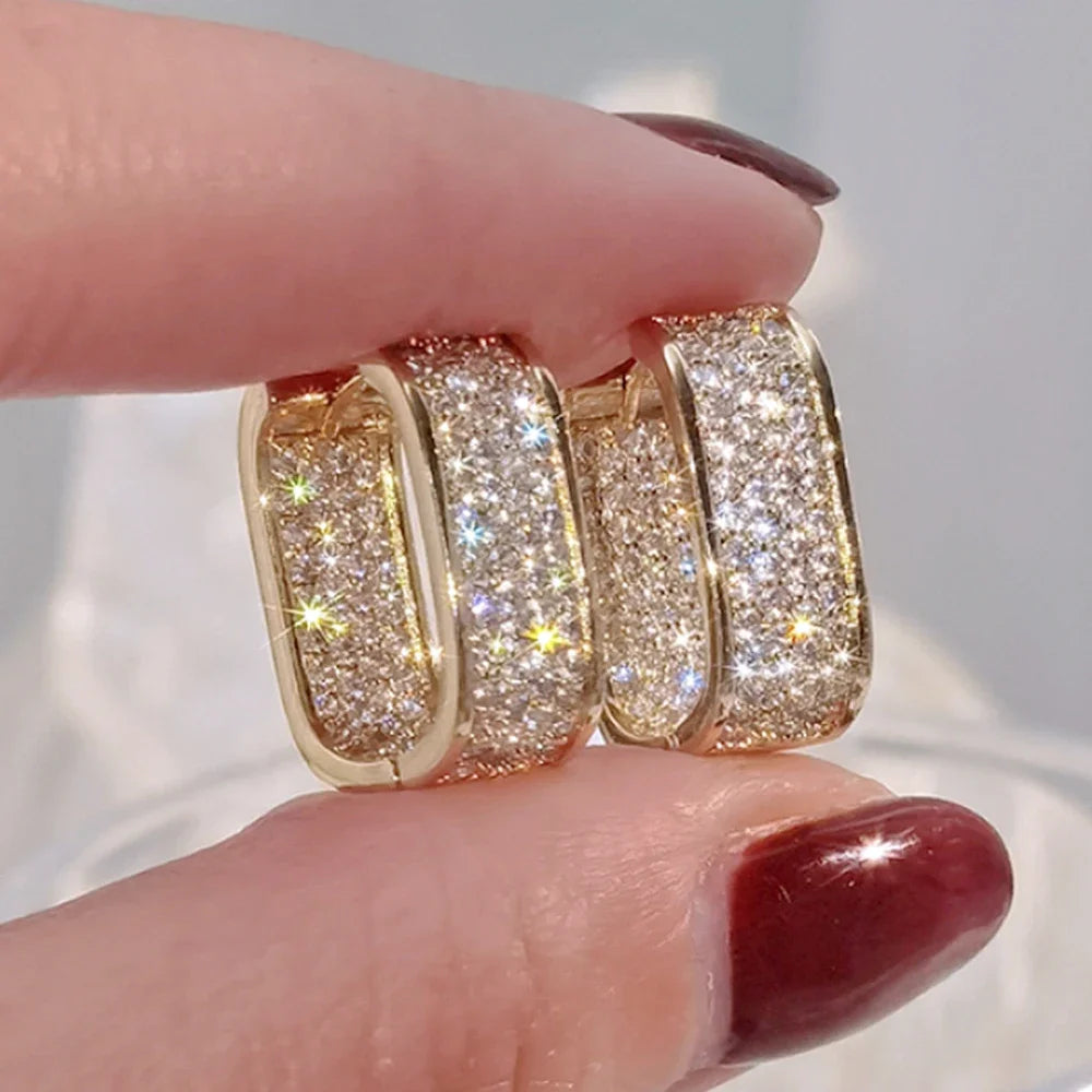 Bling Aura Hoops – CZ Luxury Statement Earrings  Maximum shine. Minimal effort. Pure elegance.