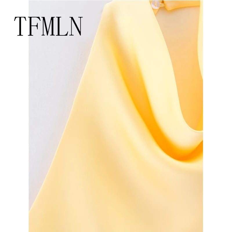 HalterChic Vest – Backless Waistcoat Top  Sharp style. Open back. Effortless elegance.