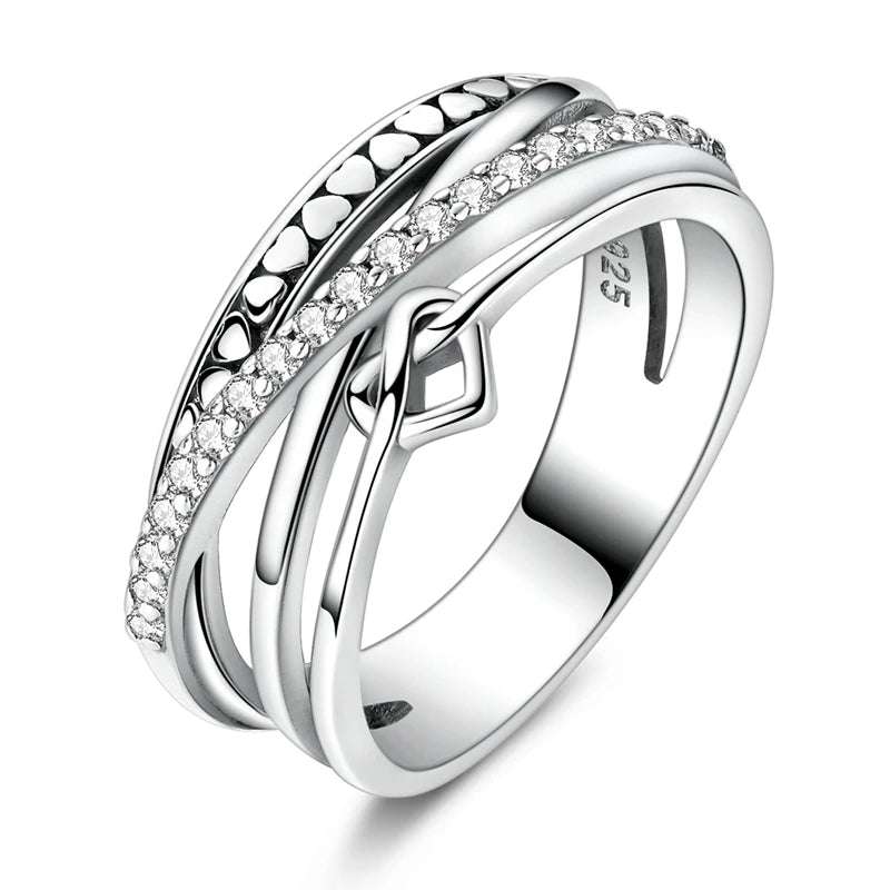 InfinityTwist Ring – 925 Silver Zircon Band  Elegant lines. Timeless shine. A symbol of forever.
