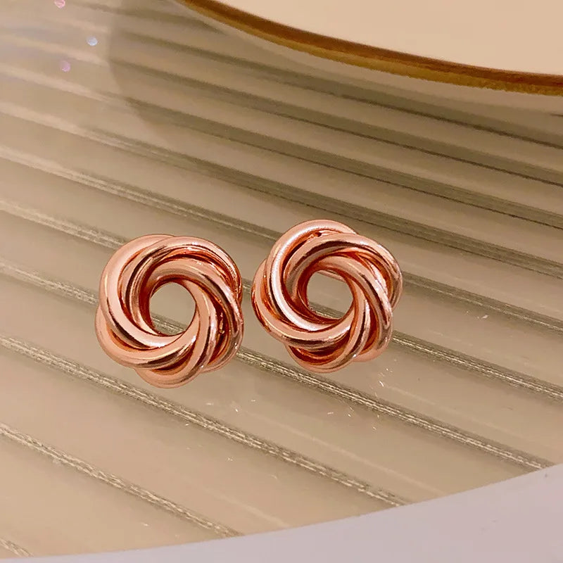Twist Aura Hoops – Multi-Layer Geometric Earrings  Layered design. Bold shine. Modern elegance.