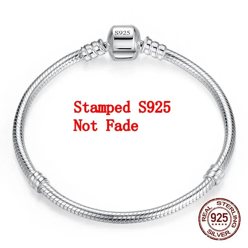 Silver Serpent Charm Bracelet – 925 Sterling Silver  Pure silver. Smooth feel. Timeless elegance.