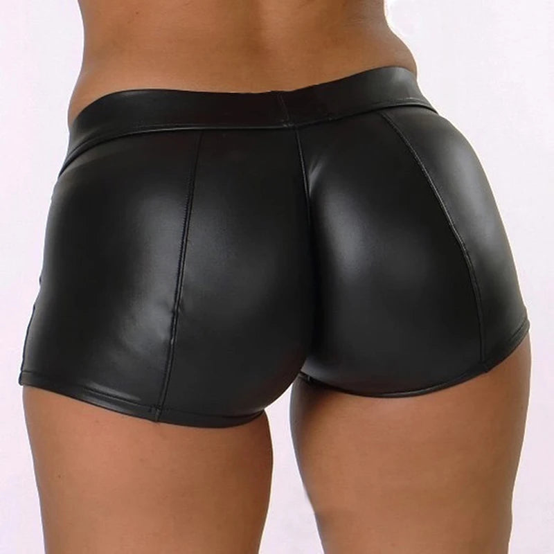 NoirShine Mini Shorts – High-Waist PU Leather Fit  Glossy finish. Sculpted curves. Night-ready energy.