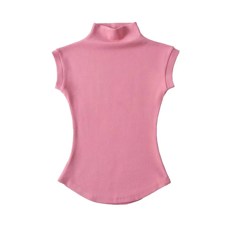 SleekMuse Sleeveless Tee – High Neck Slim Fit Top  Minimal design. Sculpted fit. Effortless style.