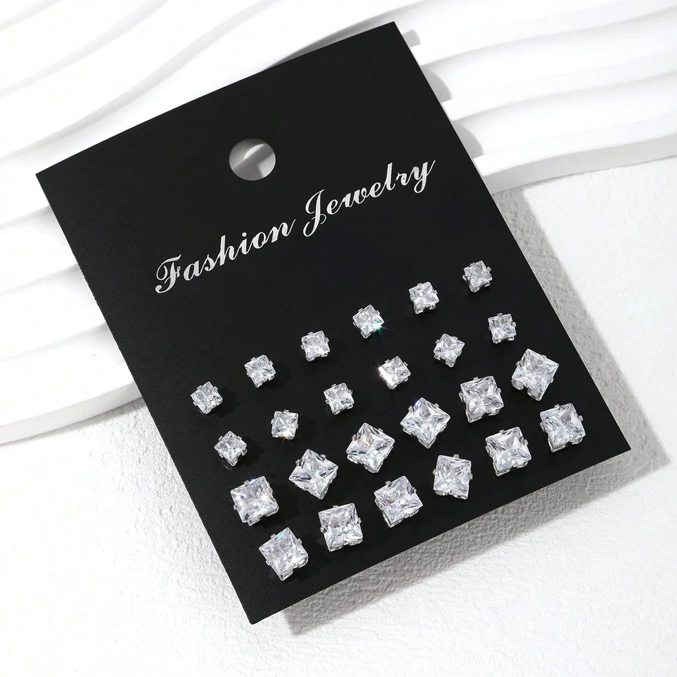 LuxeSpark Earring Set – 12 Pairs Zirconia Collection  Shine daily. Mix your style. Luxury made simple.