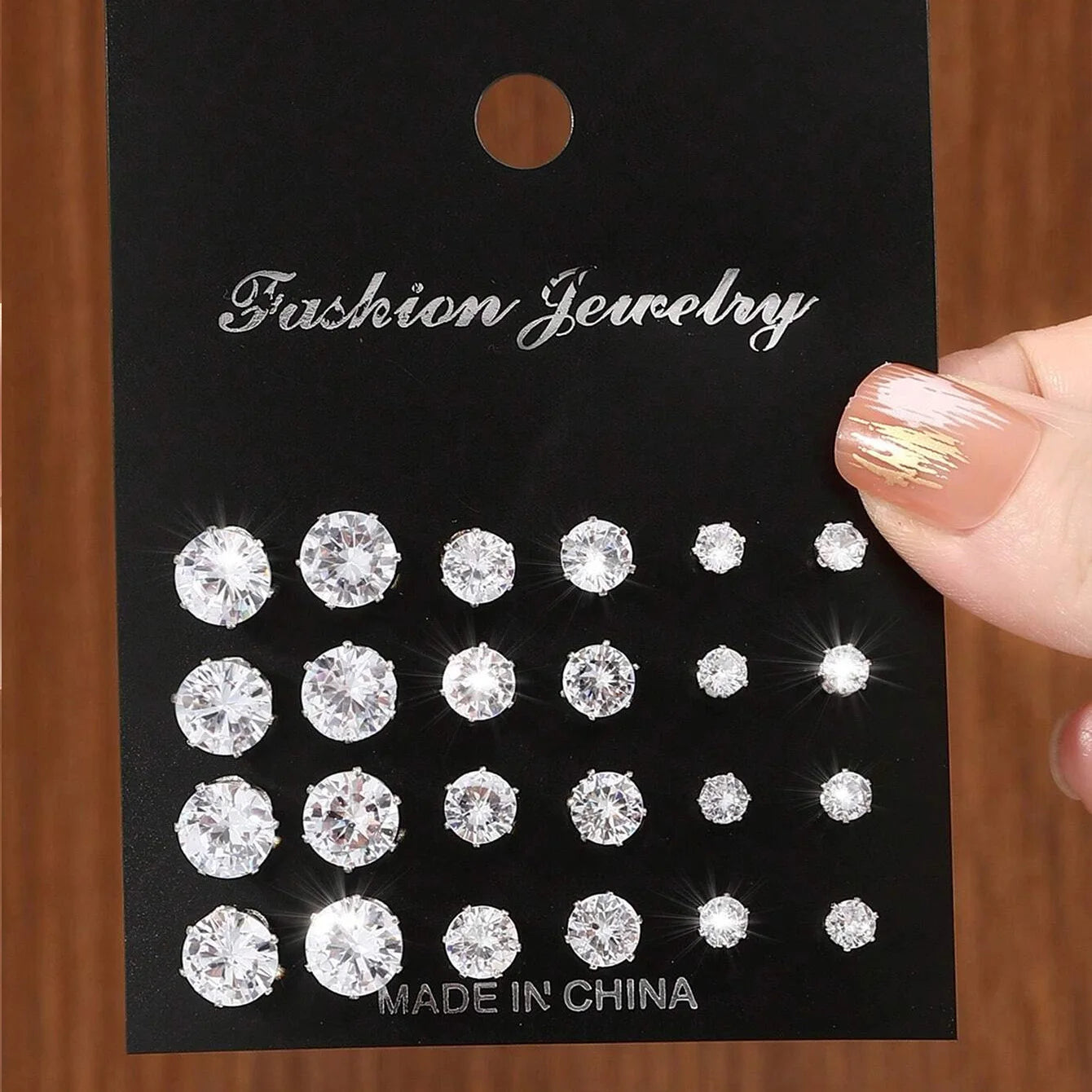 LuxeSpark Earring Set – 12 Pairs Zirconia Collection  Shine daily. Mix your style. Luxury made simple.