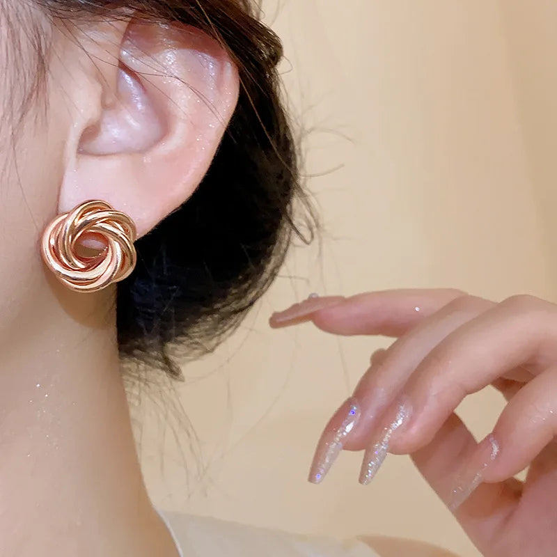 Twist Aura Hoops – Multi-Layer Geometric Earrings  Layered design. Bold shine. Modern elegance.