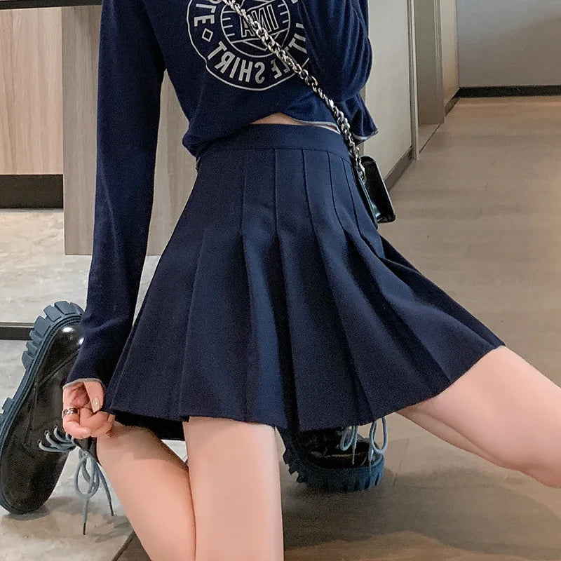 ClassyPleat Mini Skirt – High-Waist JK A-Line Style  Playful pleats. Flattering fit. Timeless vibe.