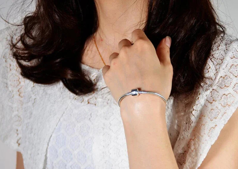 SilverSerpent Bracelet – 925 Sterling Snake Chain  Smooth shine. Timeless design. Pure elegance.